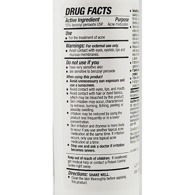 Drug facts label on a skincare product container